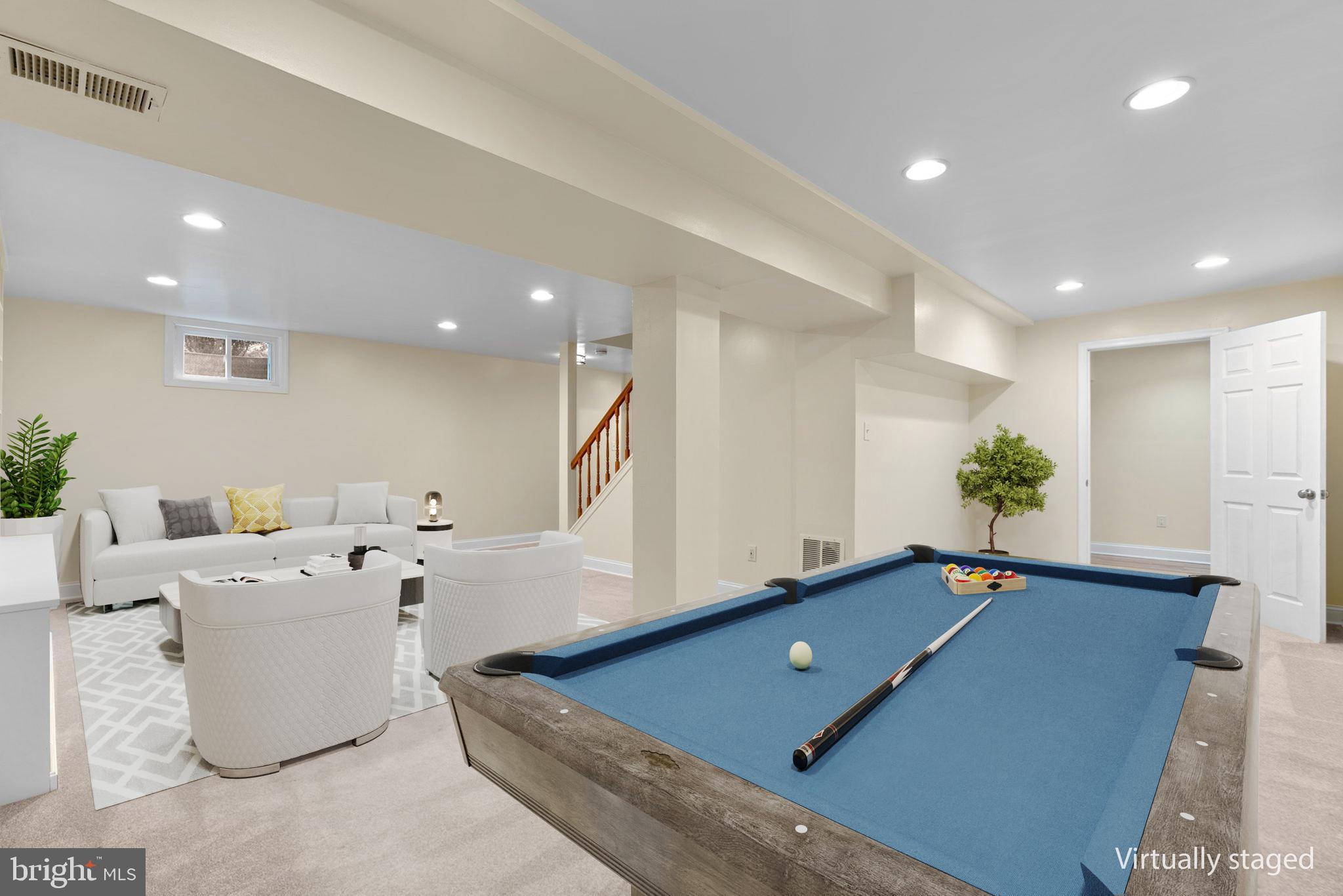 2 Oxley Square Road Gaithersburg, MD 20877 - Photo 35 of 49 a living room with furniture pool table and a potted plant