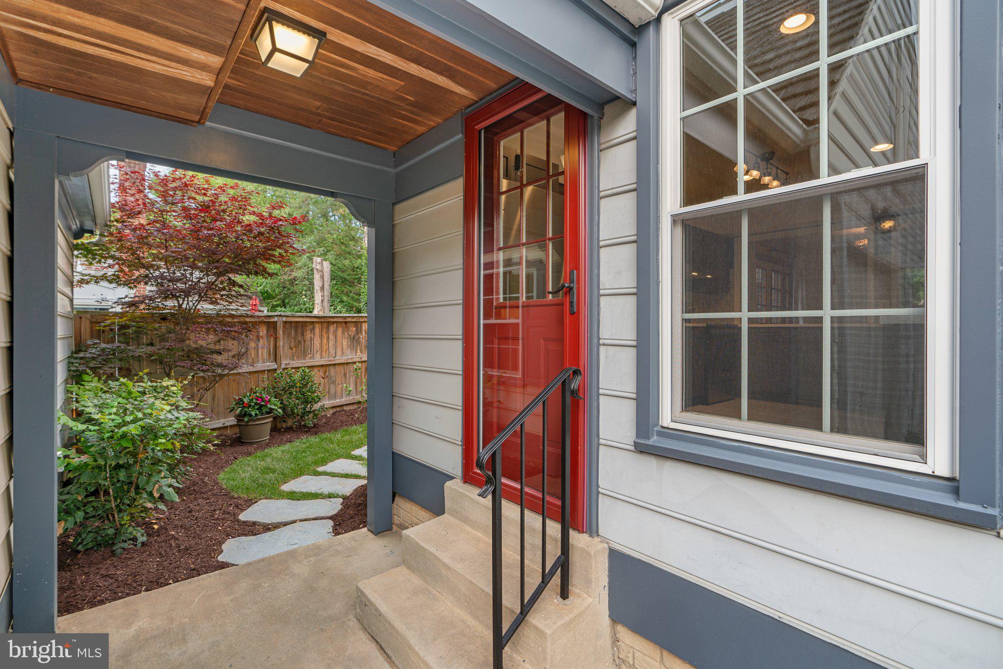 2 Oxley Square Road Gaithersburg, MD 20877 - Photo 43 of 49 a view of a porch with a floor to ceiling window and wooden fence
