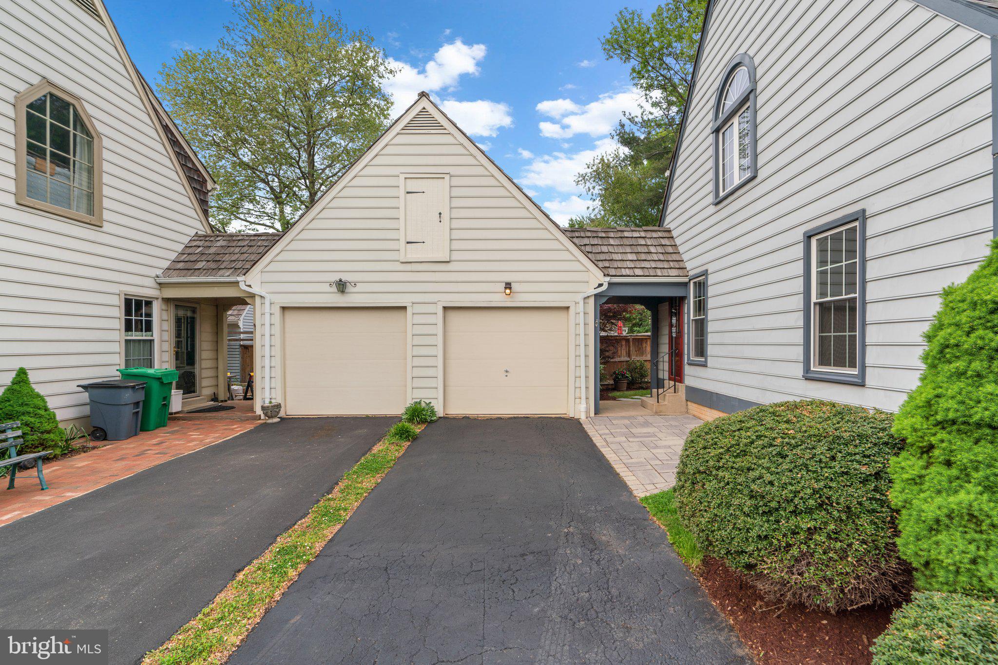 2 Oxley Square Road Gaithersburg, MD 20877 - Photo 44 of 49 a front view of a house with a yard and potted plants