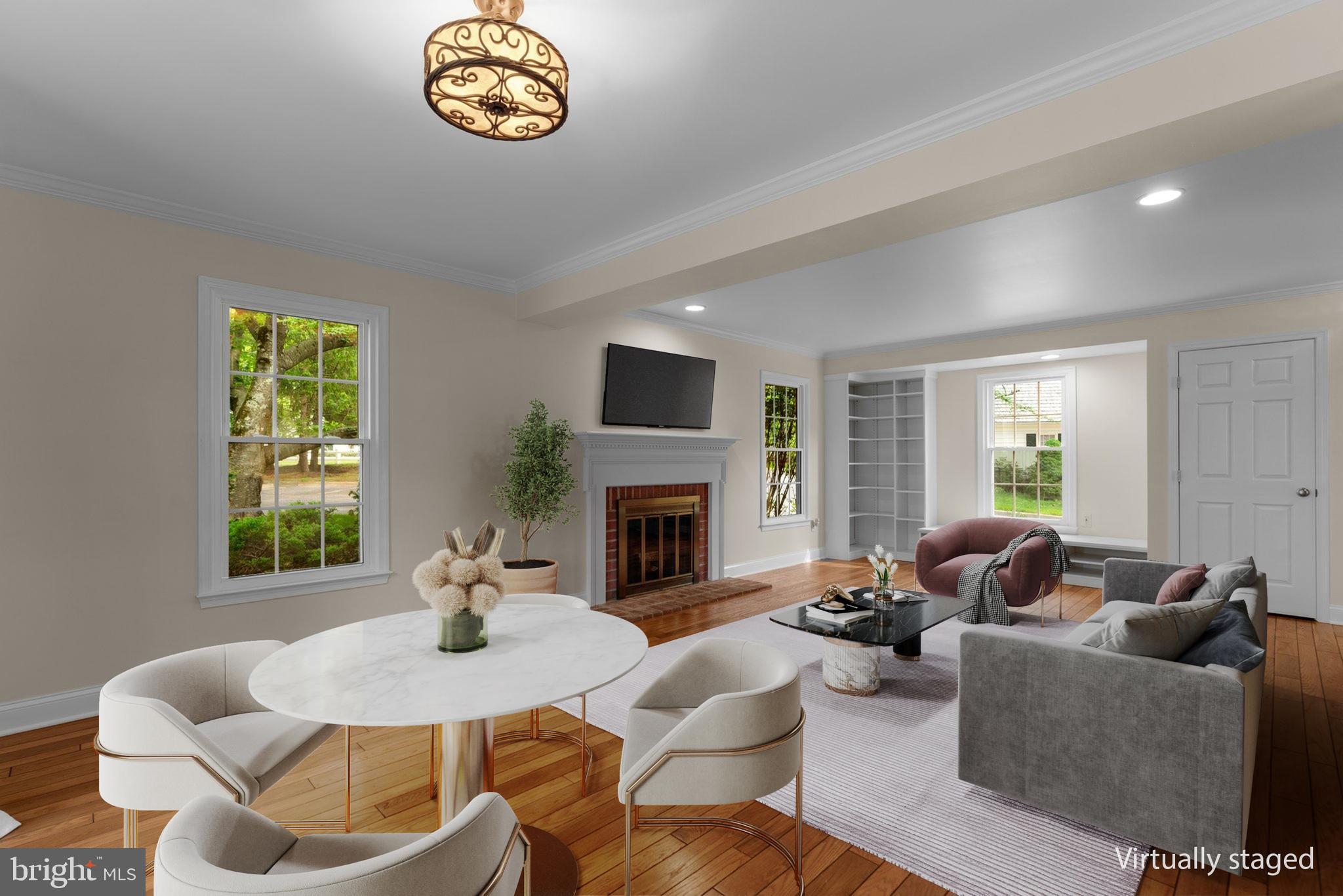 2 Oxley Square Road Gaithersburg, MD 20877 - Photo 8 of 49 a living room with furniture a fireplace and a window