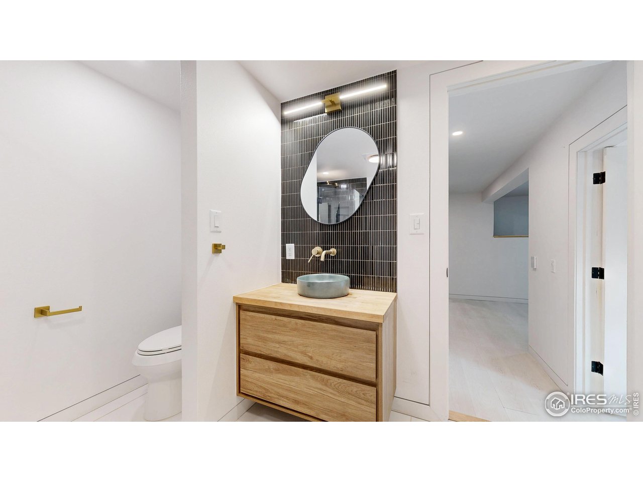 710 Tanager Road Estes Park, CO 80517 - Photo 23 of 43 Downstairs Bathroom.