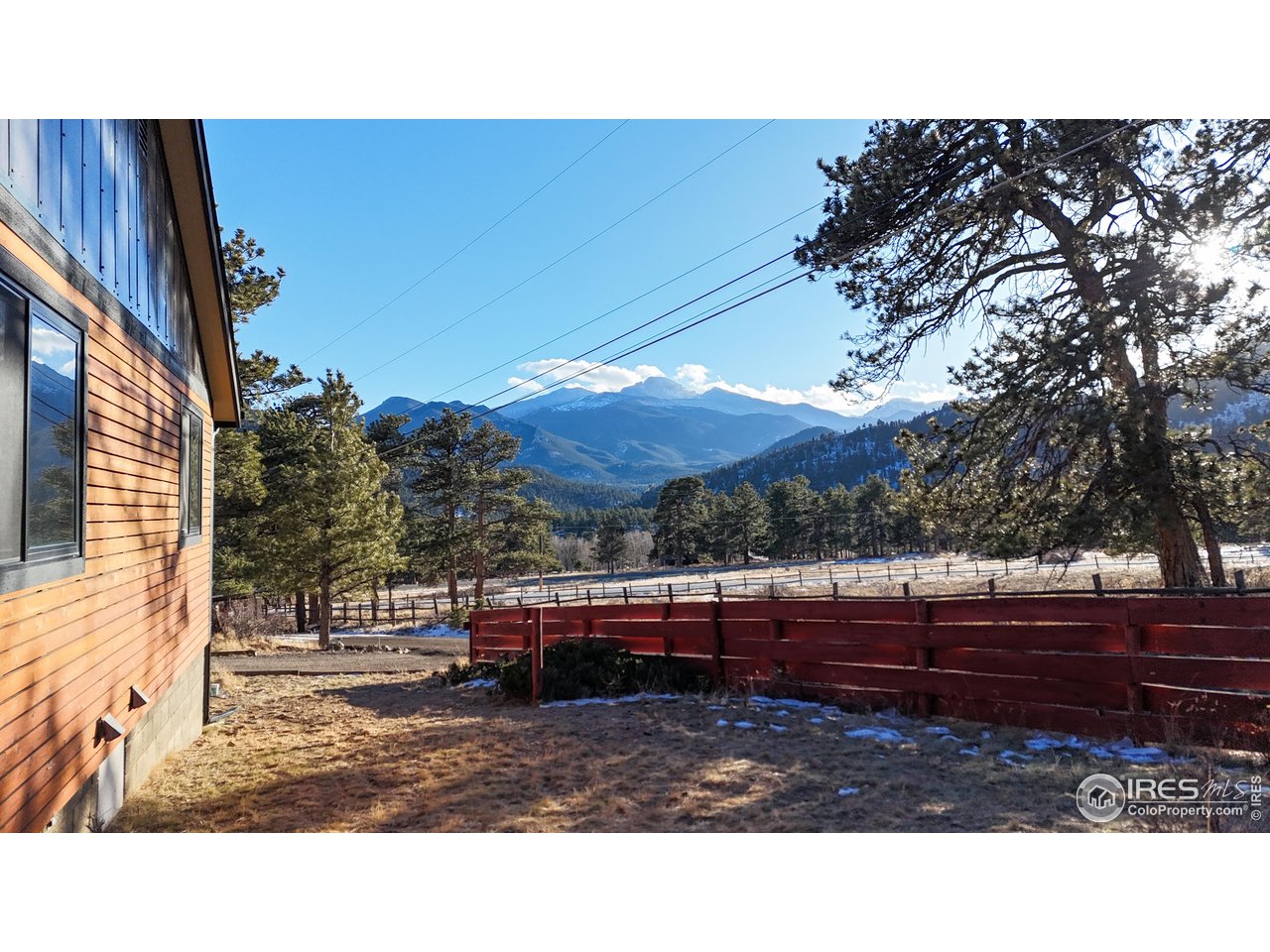 710 Tanager Road Estes Park, CO 80517 - Photo 32 of 43 Amazing Longs Peak and Mount Meeker views from the west yard area.