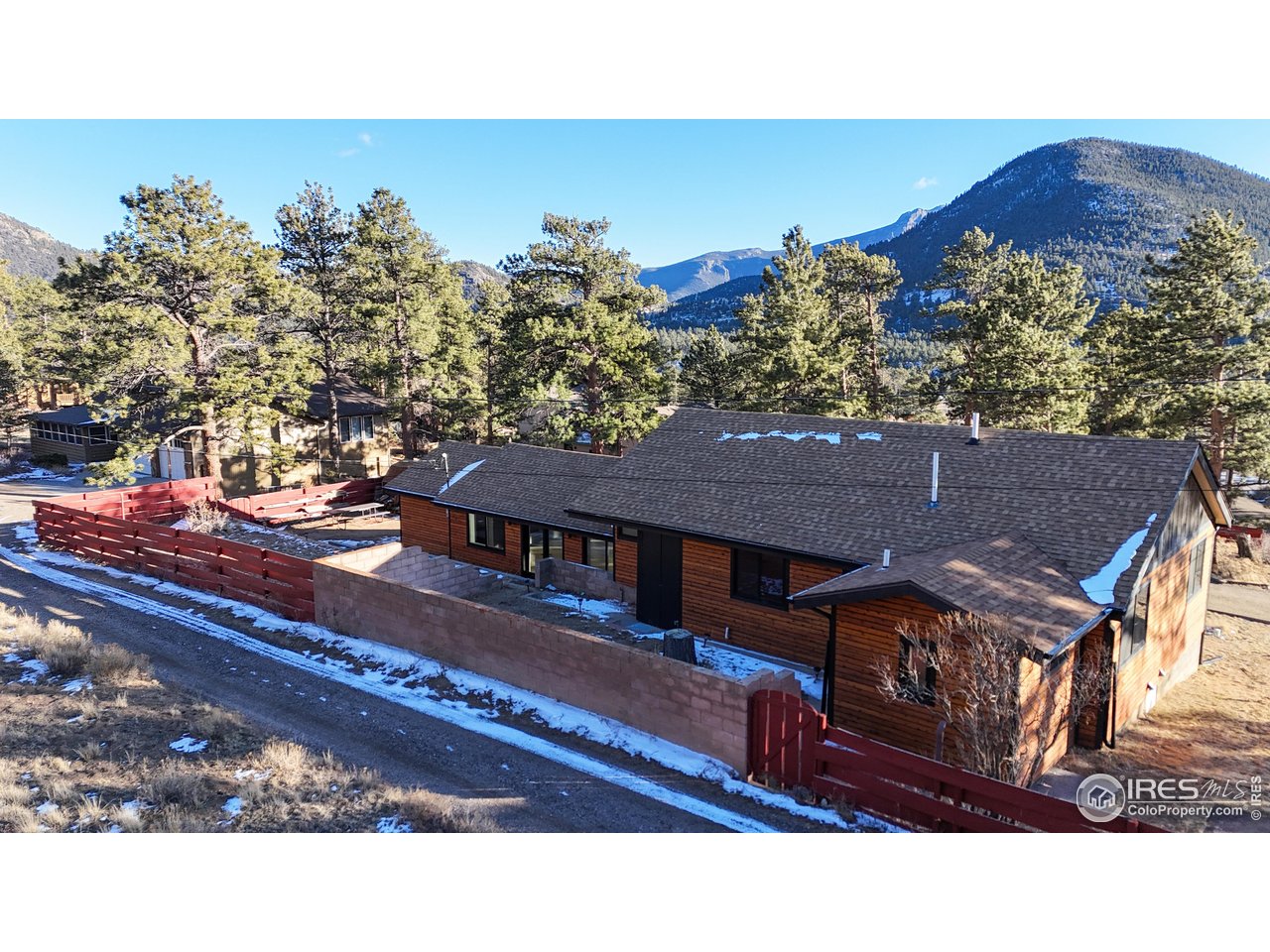 710 Tanager Road Estes Park, CO 80517 - Photo 35 of 43 Would just need to add a driveway gate to fully fence the entire yard.