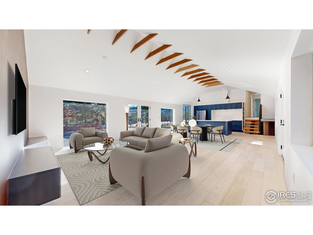 710 Tanager Road Estes Park, CO 80517 - Photo 4 of 43 Great Room (Living, Dining, Kitchen) digitally staged.