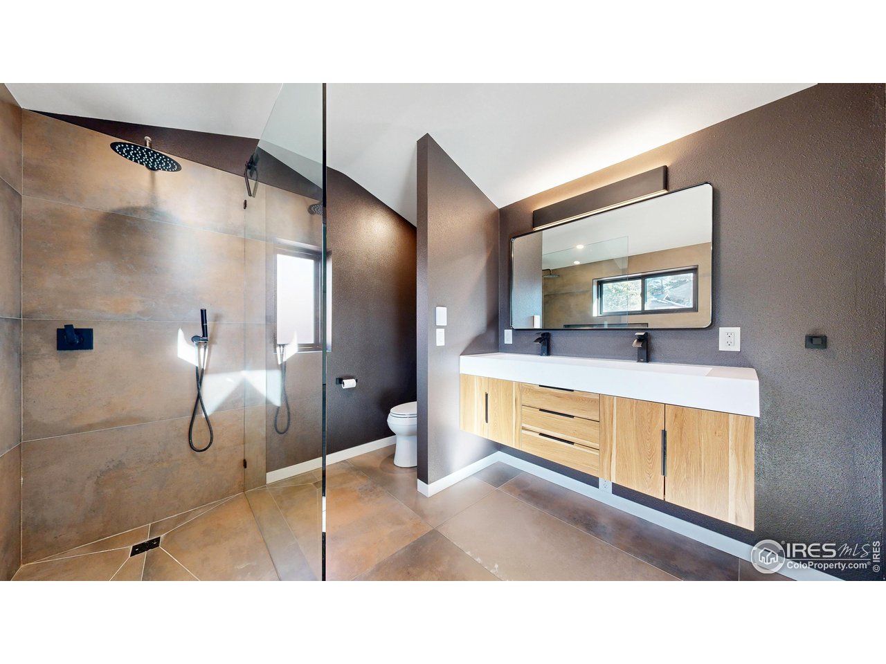 710 Tanager Road Estes Park, CO 80517 - Photo 5 of 43 Primary Bedroom ensuite Bathroom.