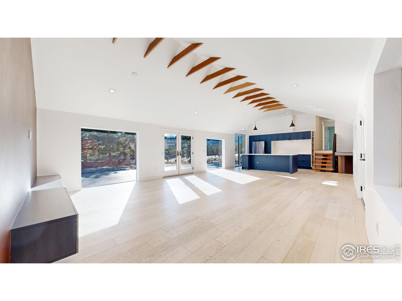 710 Tanager Road Estes Park, CO 80517 - Photo 7 of 43 Large open living room with lots of natural light.