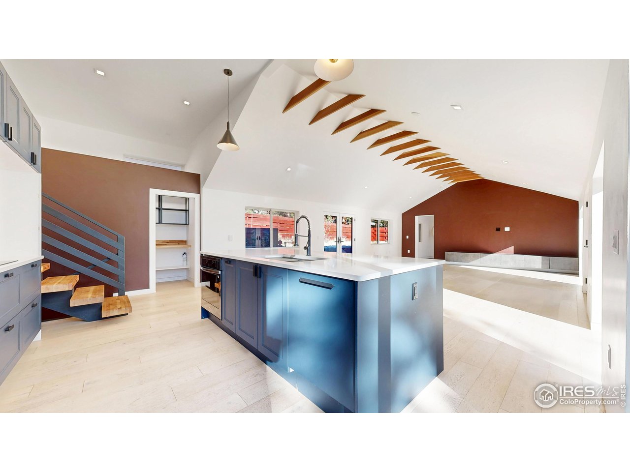 710 Tanager Road Estes Park, CO 80517 - Photo 9 of 43 Kitchen looking into the living room.