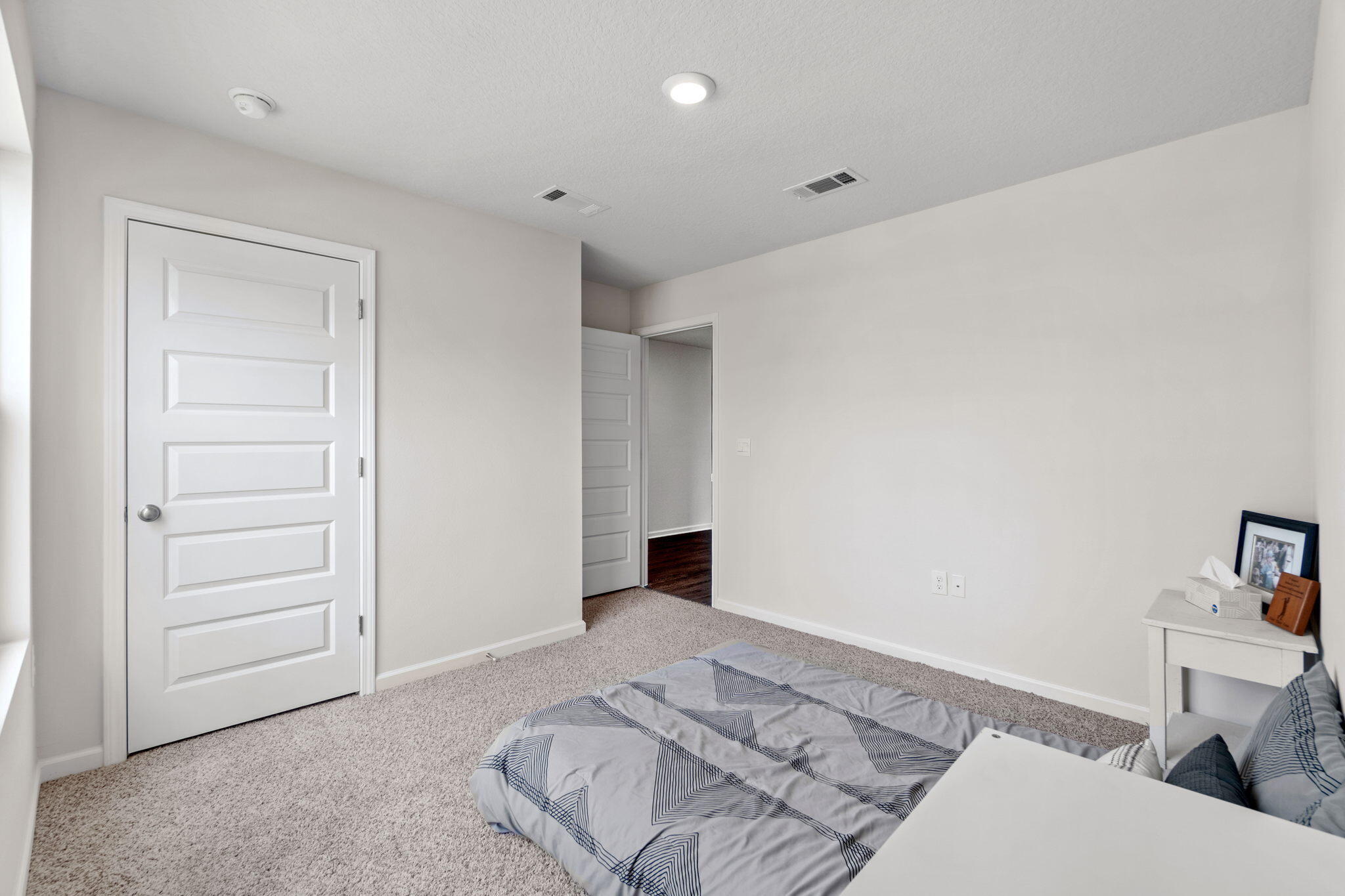 209 Laurel Hill Street Crestview, FL 32539 - Photo 23 of 43 a bedroom with a bed and a bathroom