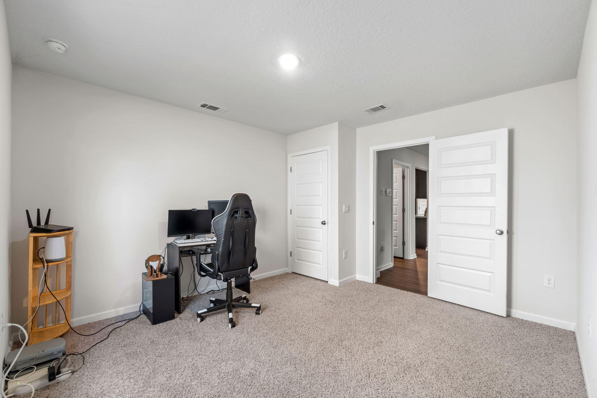 209 Laurel Hill Street Crestview, FL 32539 - Photo 28 of 43 a view of a workspace with furniture and a window