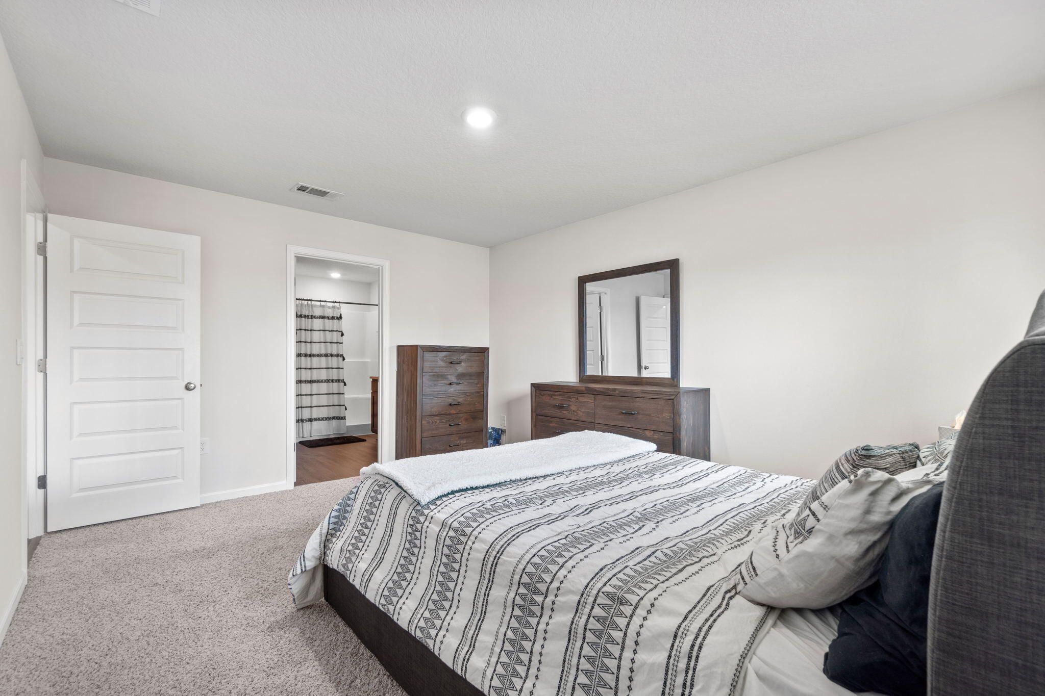 209 Laurel Hill Street Crestview, FL 32539 - Photo 31 of 43 a bedroom with a bed and a closet