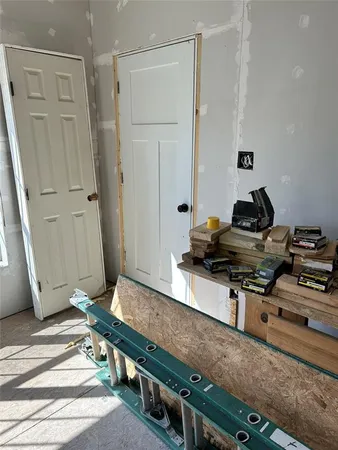 a room with furniture and wooden floor