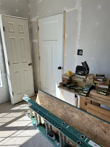 a room with furniture and wooden floor