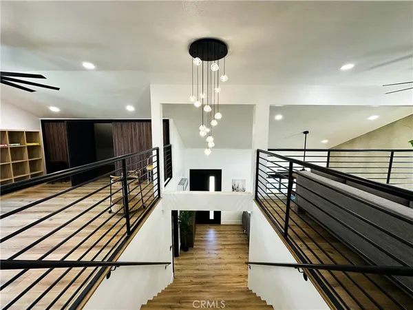 a view of a lobby with black carpet