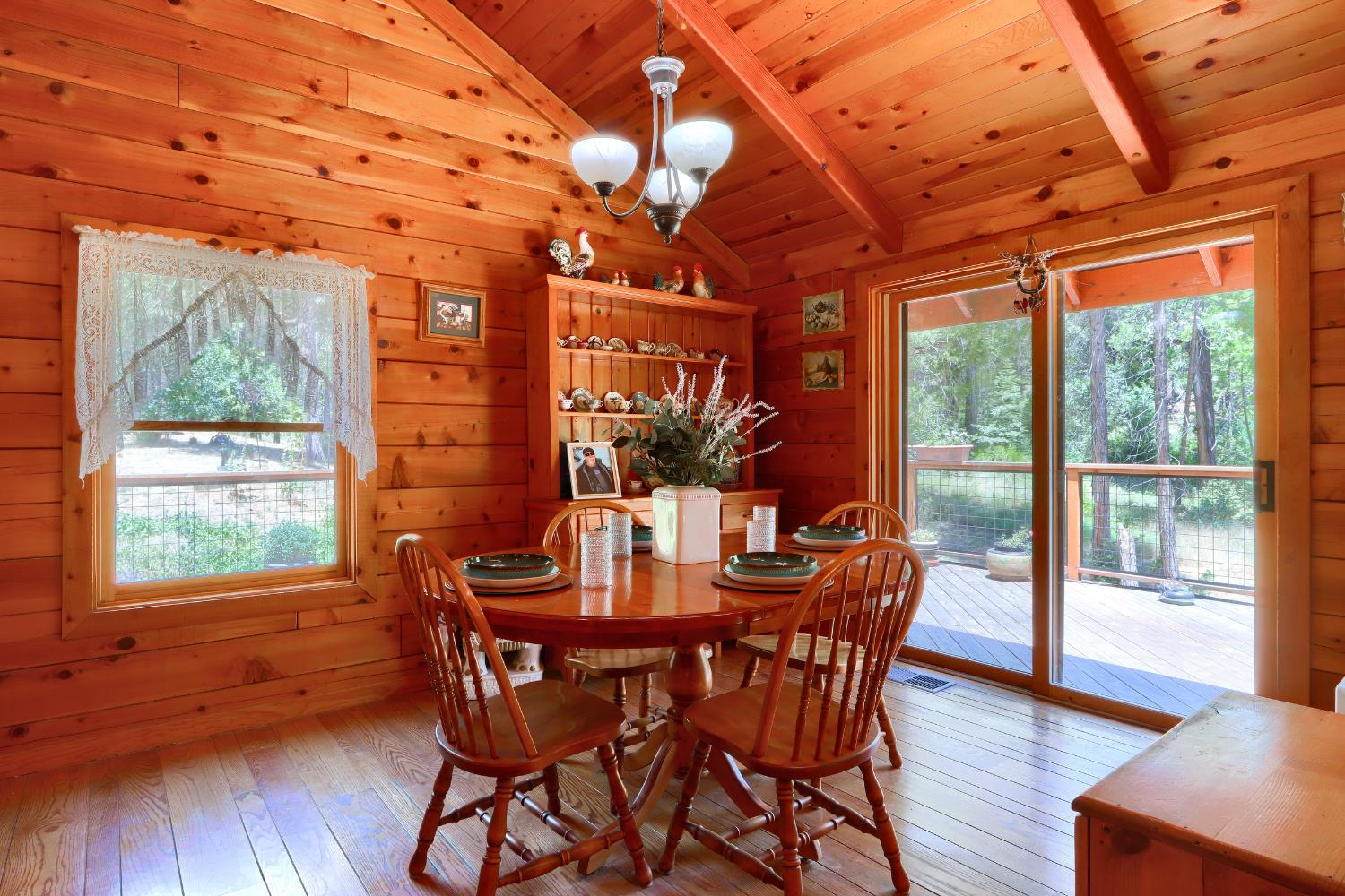 7190 Hites Cove Road Mariposa, CA 95338 - Photo 12 of 61 a dining room with furniture window and wooden floor