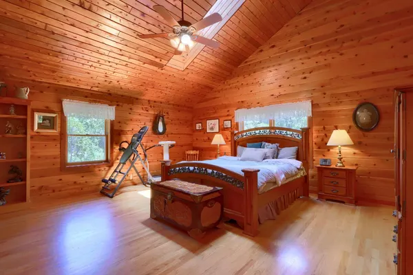view of backyard with wooden floor and windows