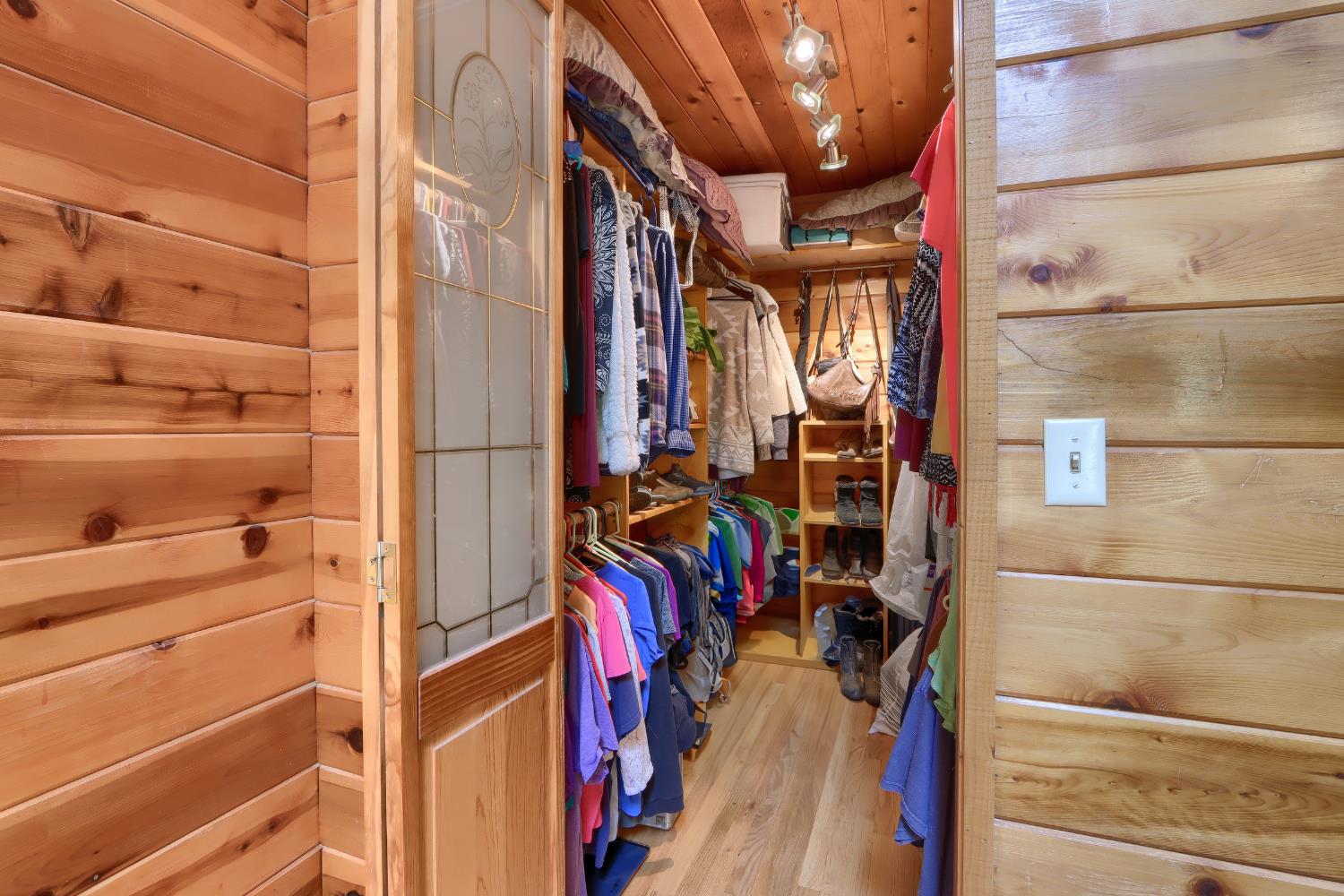 7190 Hites Cove Road Mariposa, CA 95338 - Photo 21 of 61 a view of walk in closet with clothes and shoes