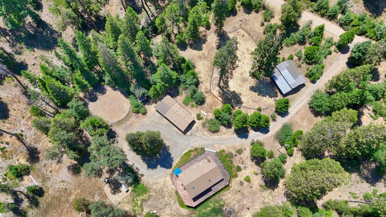 7190 Hites Cove Road Mariposa, CA 95338 - Photo 4 of 61 an aerial view of a house with a yard