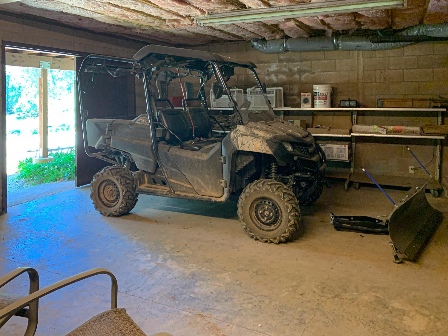 7190 Hites Cove Road Mariposa, CA 95338 - Photo 41 of 61 a blue bed sitting in a room next to a window