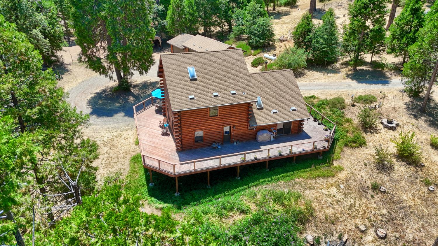 7190 Hites Cove Road Mariposa, CA 95338 - Photo 55 of 61 an aerial view of a house with a garden