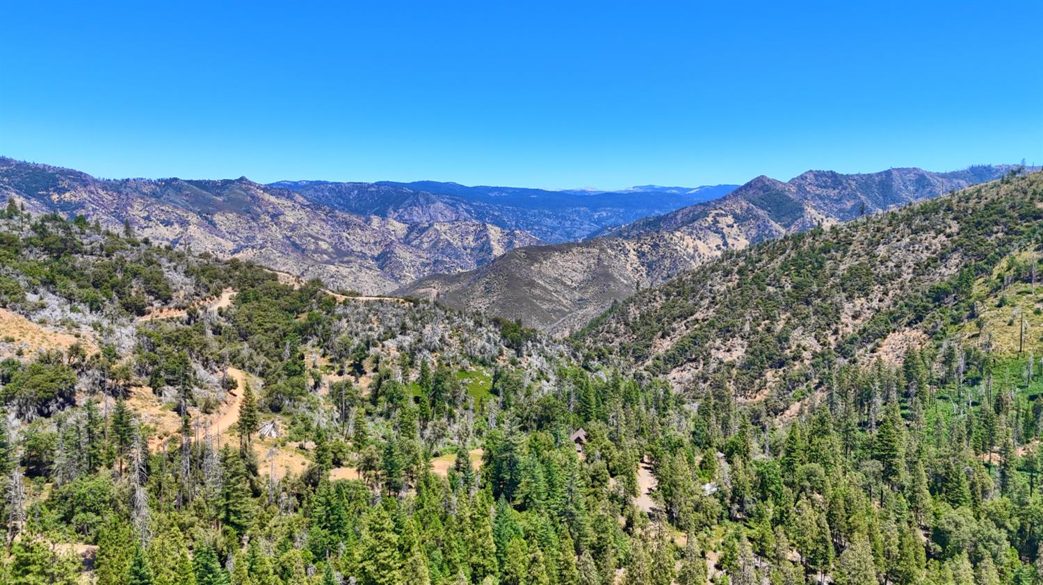 7190 Hites Cove Road Mariposa, CA 95338 - Photo 58 of 61 a view of a city with mountains in the background