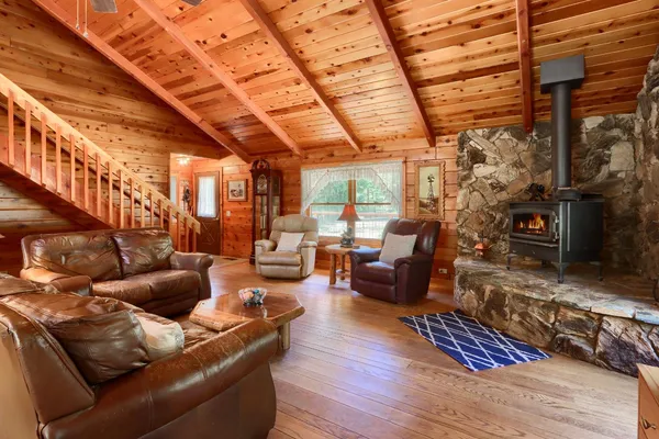 a bed sitting in a room next to a window