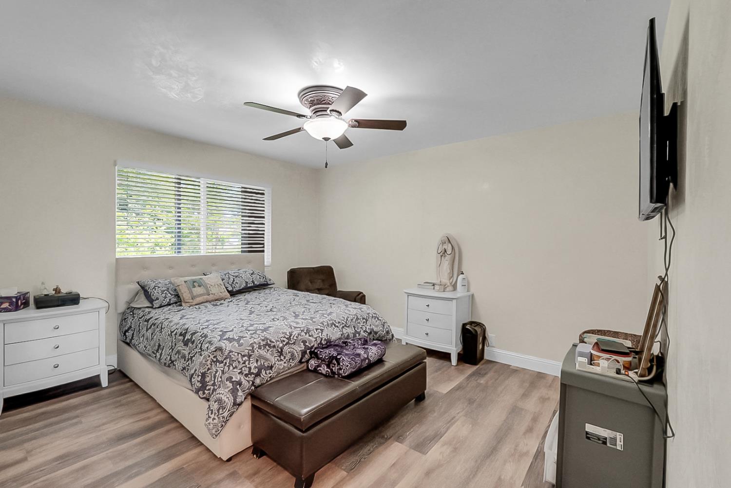 6112 Slaton Court Stockton, CA 95215 - Photo 20 of 46 a bedroom with a bed furniture and a window