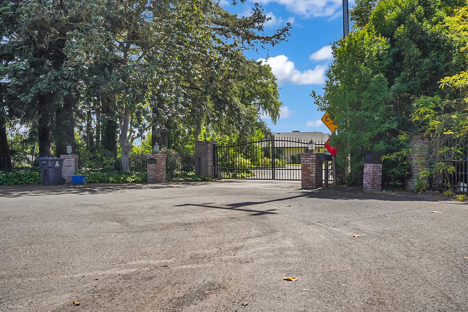 6112 Slaton Court Stockton, CA 95215 - Photo 2 of 46 a view of road and trees