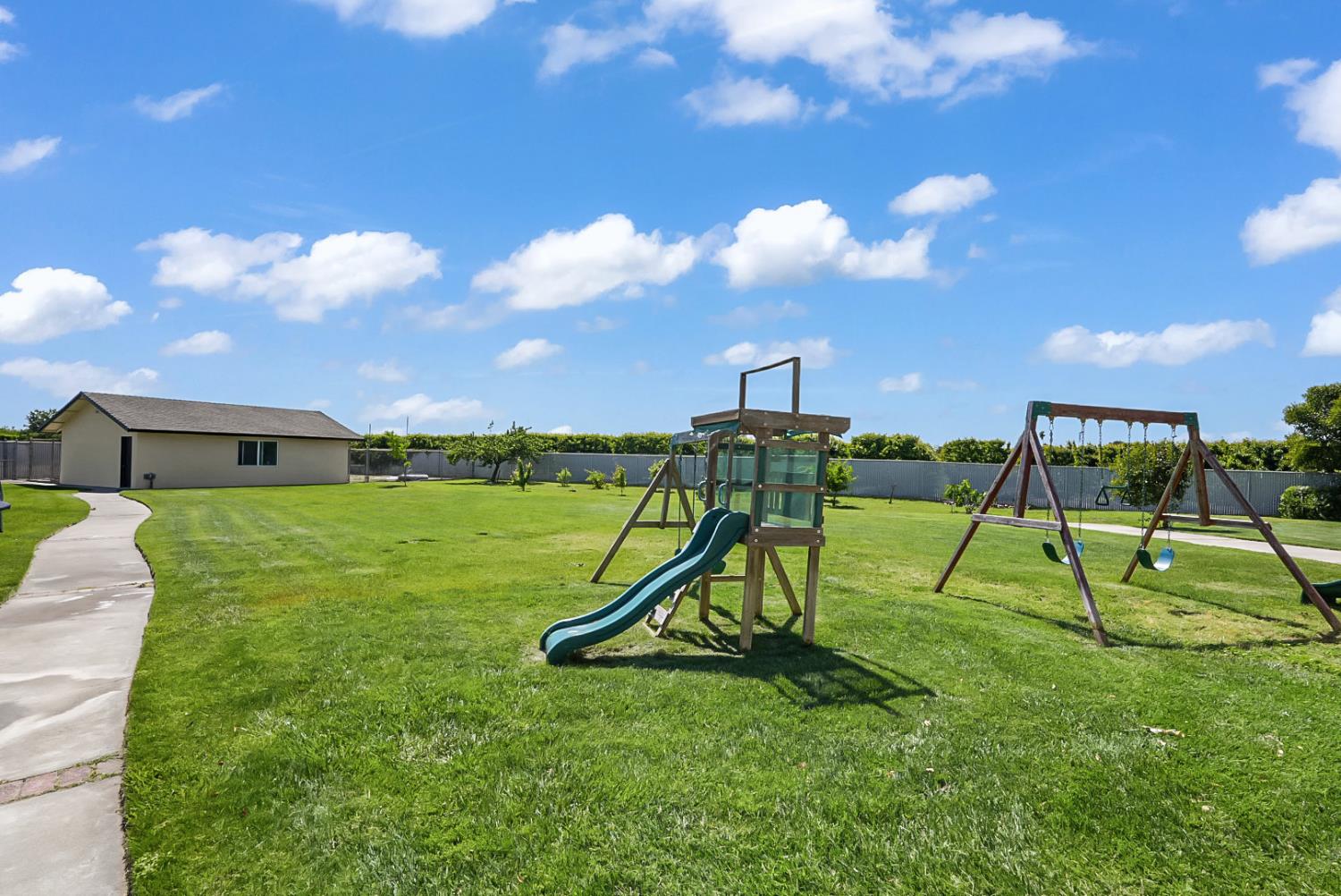 6112 Slaton Court Stockton, CA 95215 - Photo 43 of 46 a view of a playground with a slide