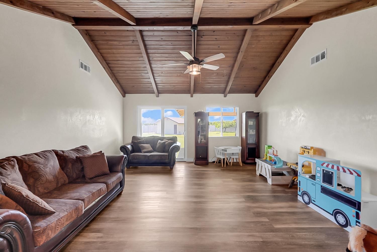 6112 Slaton Court Stockton, CA 95215 - Photo 6 of 46 a living room with furniture and wooden floor
