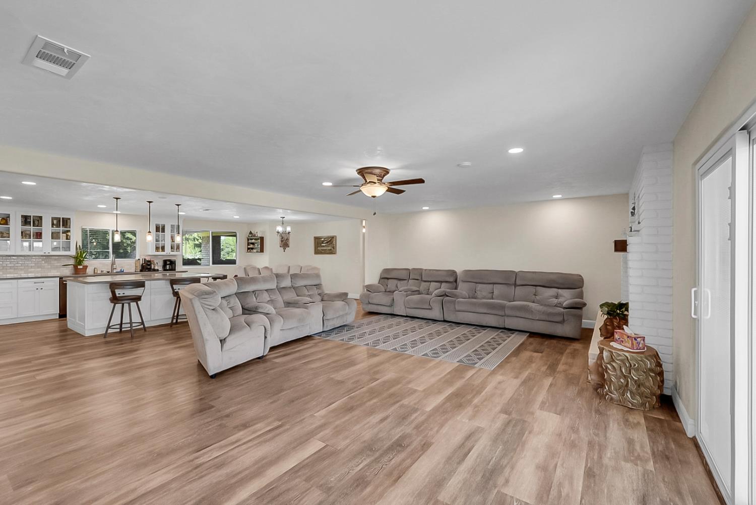 6112 Slaton Court Stockton, CA 95215 - Photo 7 of 46 a living room with furniture and kitchen view