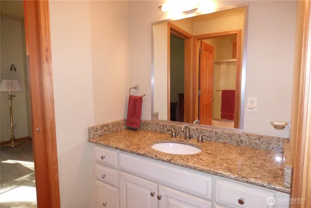 a bedroom with a bed and furniture