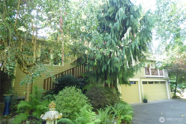 a view of an entryway with a wooden door