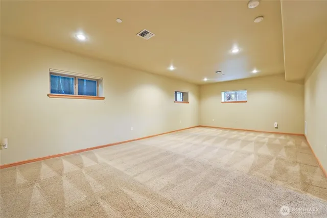 a car parked in garage with a couch