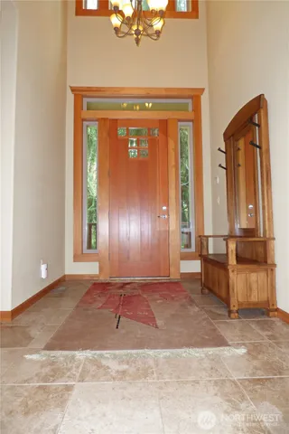 a view of a hallway with a furniture