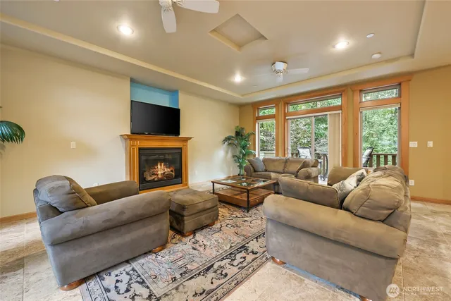 a view of balcony with table and chairs and wooden floor