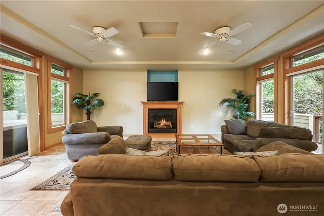 a kitchen with stainless steel appliances kitchen island granite countertop a refrigerator oven stove a sink and dishwasher