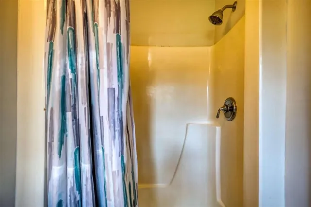 a bathroom with a sink a mirror and a toilet