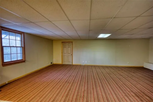 a view of a house with a back yard