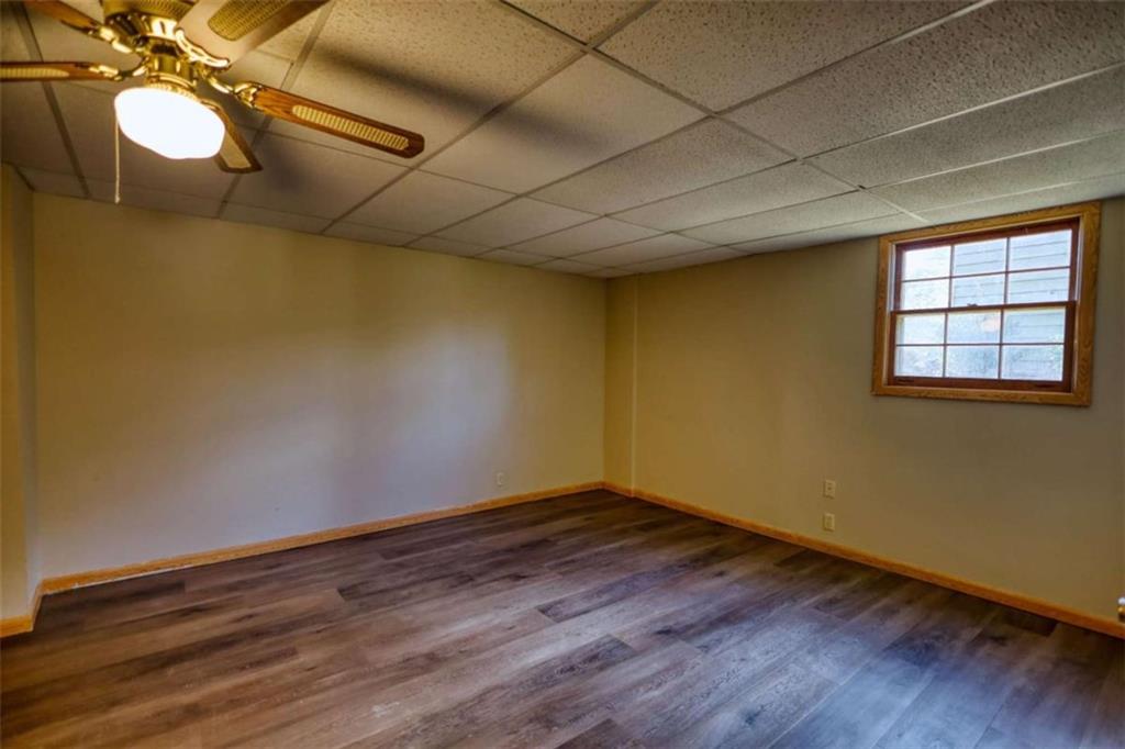 2289 Amberbrook Drive Southwest Conyers, GA 30094 - Photo 53 of 79 a view of a room with wooden floor and a window
