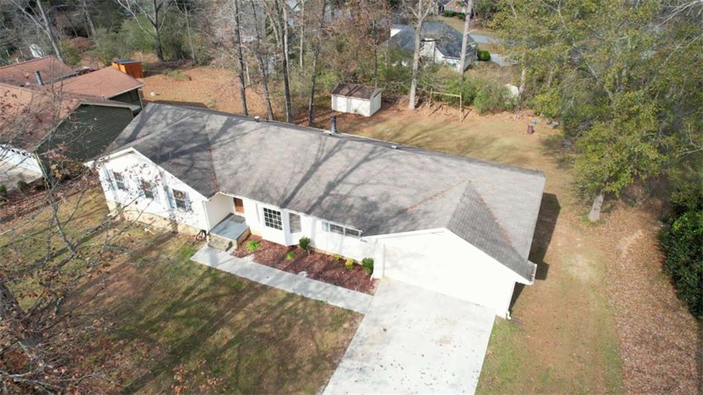 2289 Amberbrook Drive Southwest Conyers, GA 30094 - Photo 79 of 79 a view of a yard with large trees