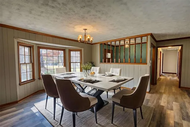 a room with furniture and wooden floor