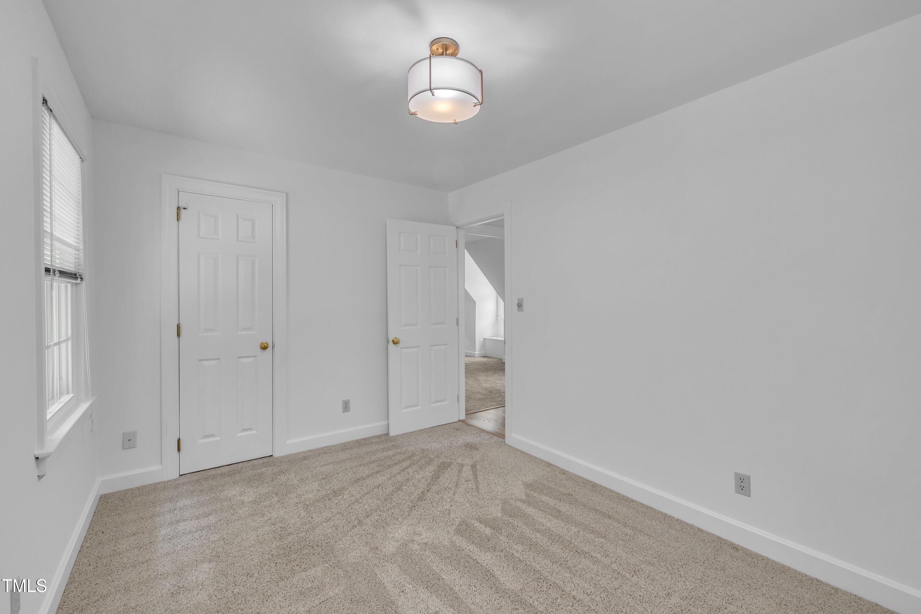 2204 Basil Drive Raleigh, NC 27612 - Photo 28 of 49 wooden floor in an empty room