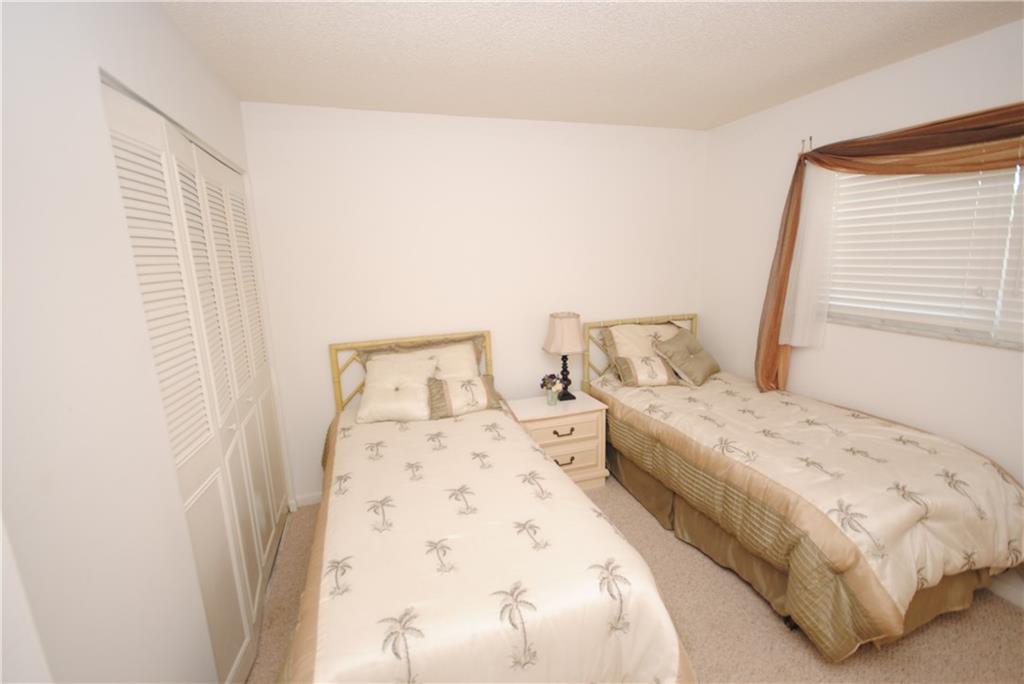 1997 Southwest Palm City Road, Unit I Stuart, FL 34994 - Photo 18 of 36 Second Bedroom