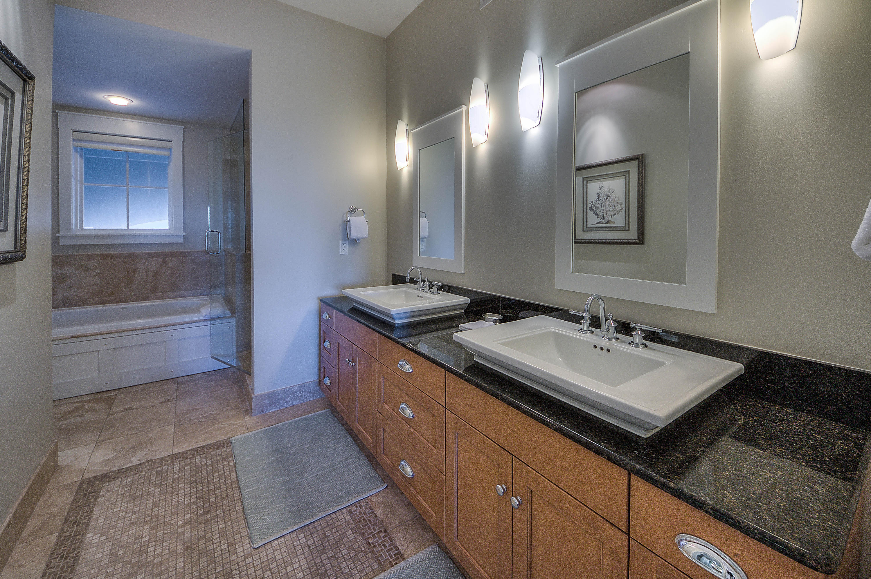 37 Compass Point Way, Unit 101 Watersound, FL 32461 - Photo 11 of 31 a bathroom with a sink and two mirror