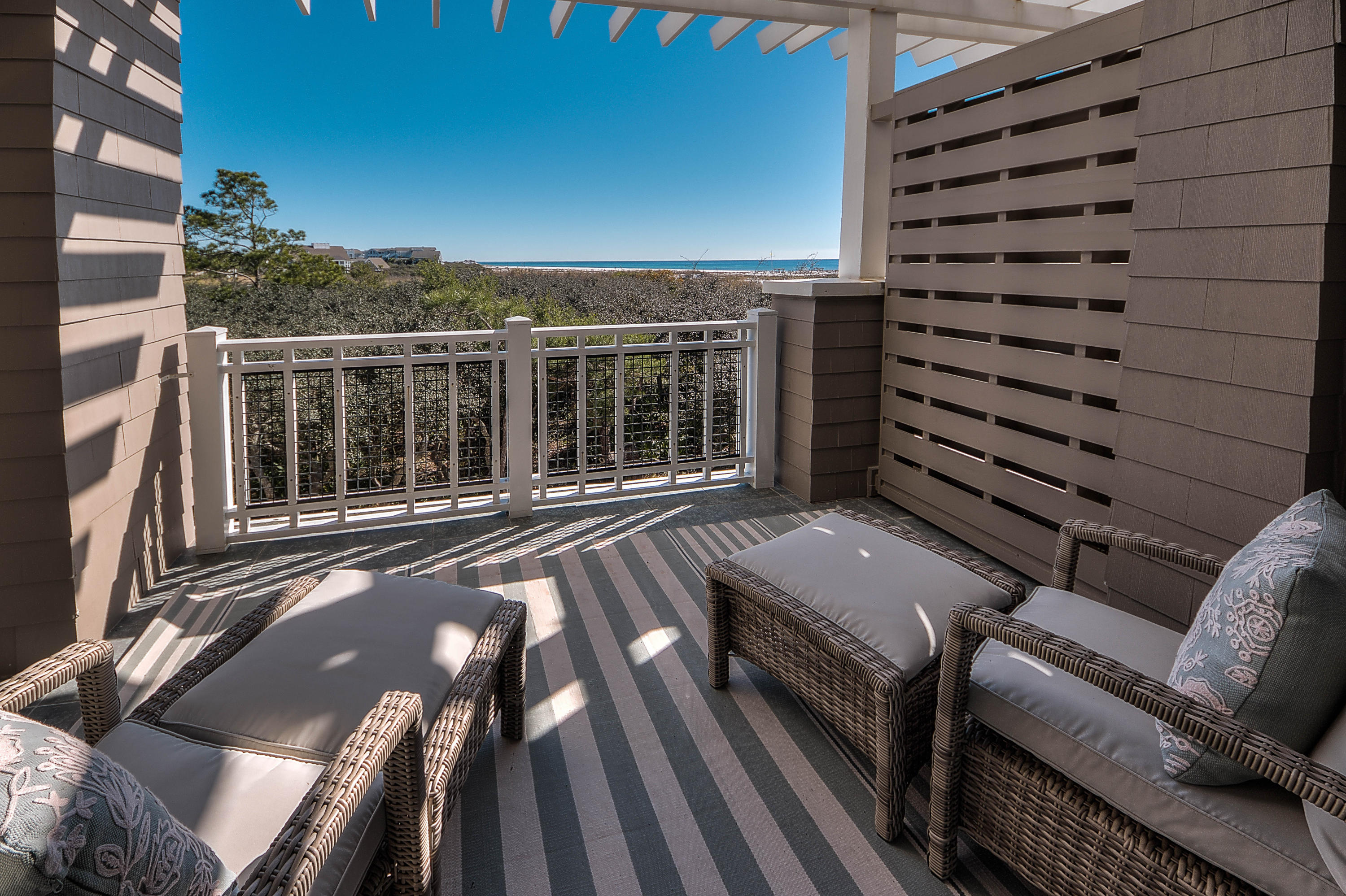 37 Compass Point Way, Unit 101 Watersound, FL 32461 - Photo 16 of 31 a view of a balcony with chairs