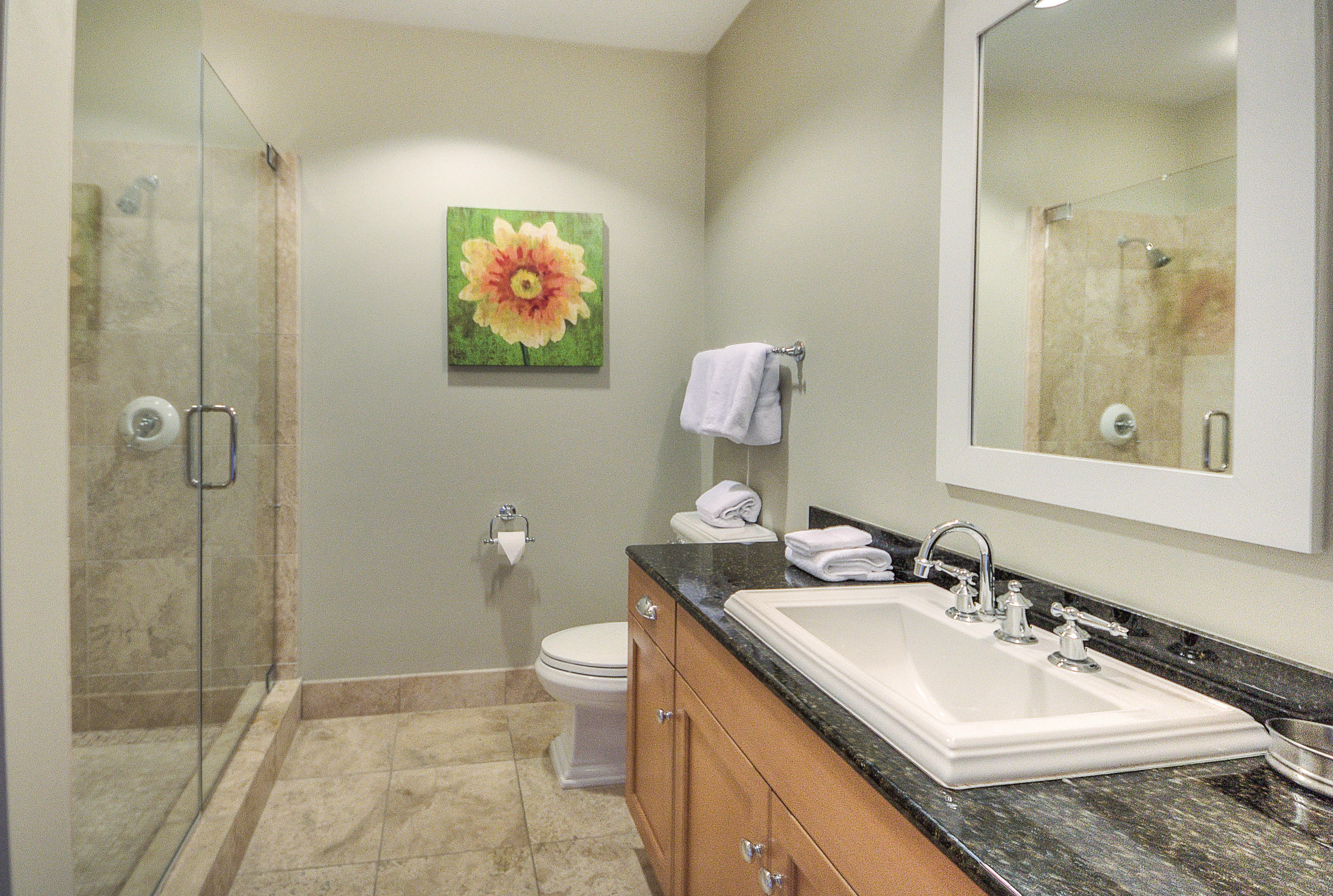 37 Compass Point Way, Unit 101 Watersound, FL 32461 - Photo 24 of 31 a bathroom with a sink and a mirror