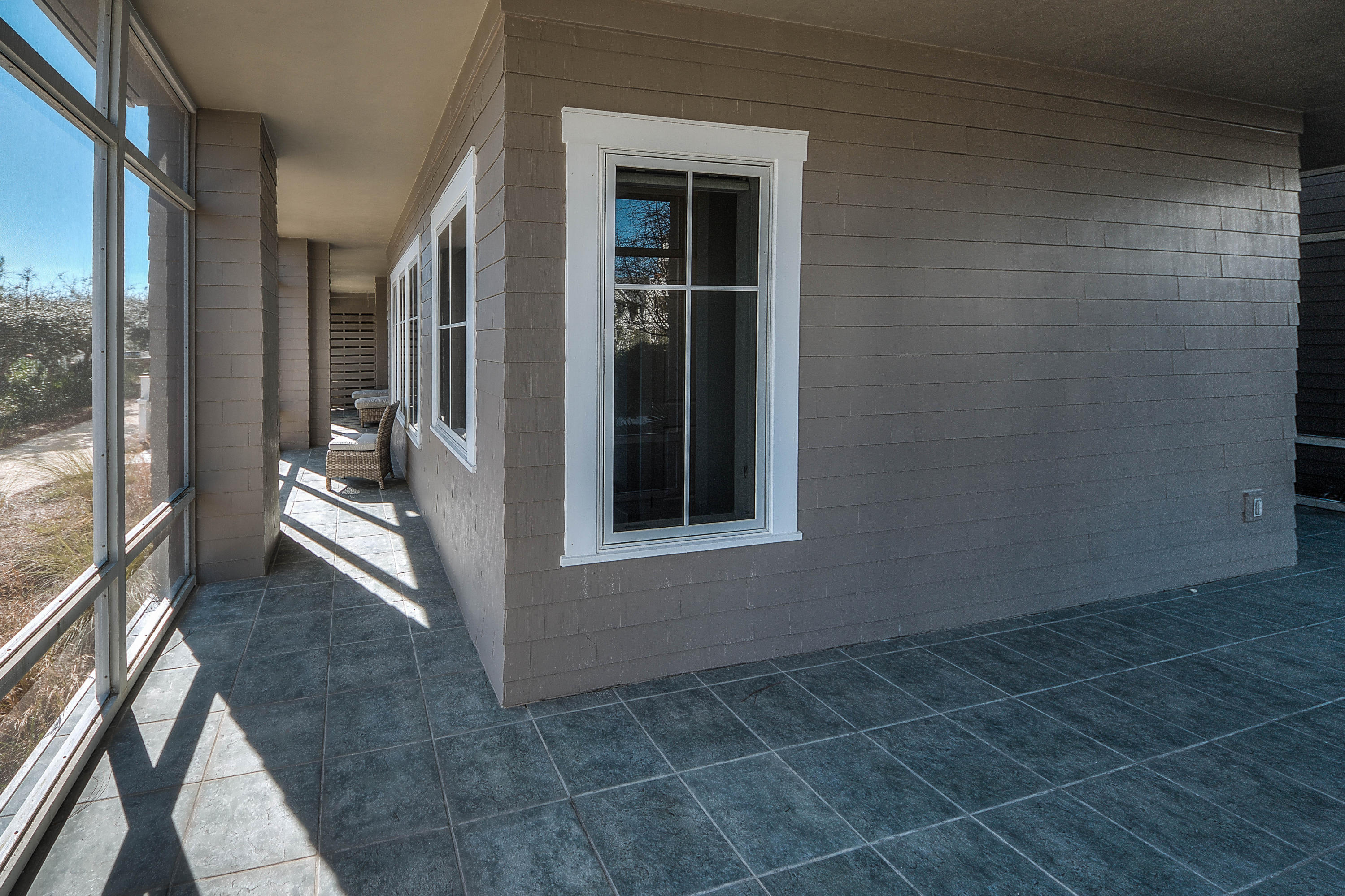 37 Compass Point Way, Unit 101 Watersound, FL 32461 - Photo 26 of 31 a view of balcony and living room