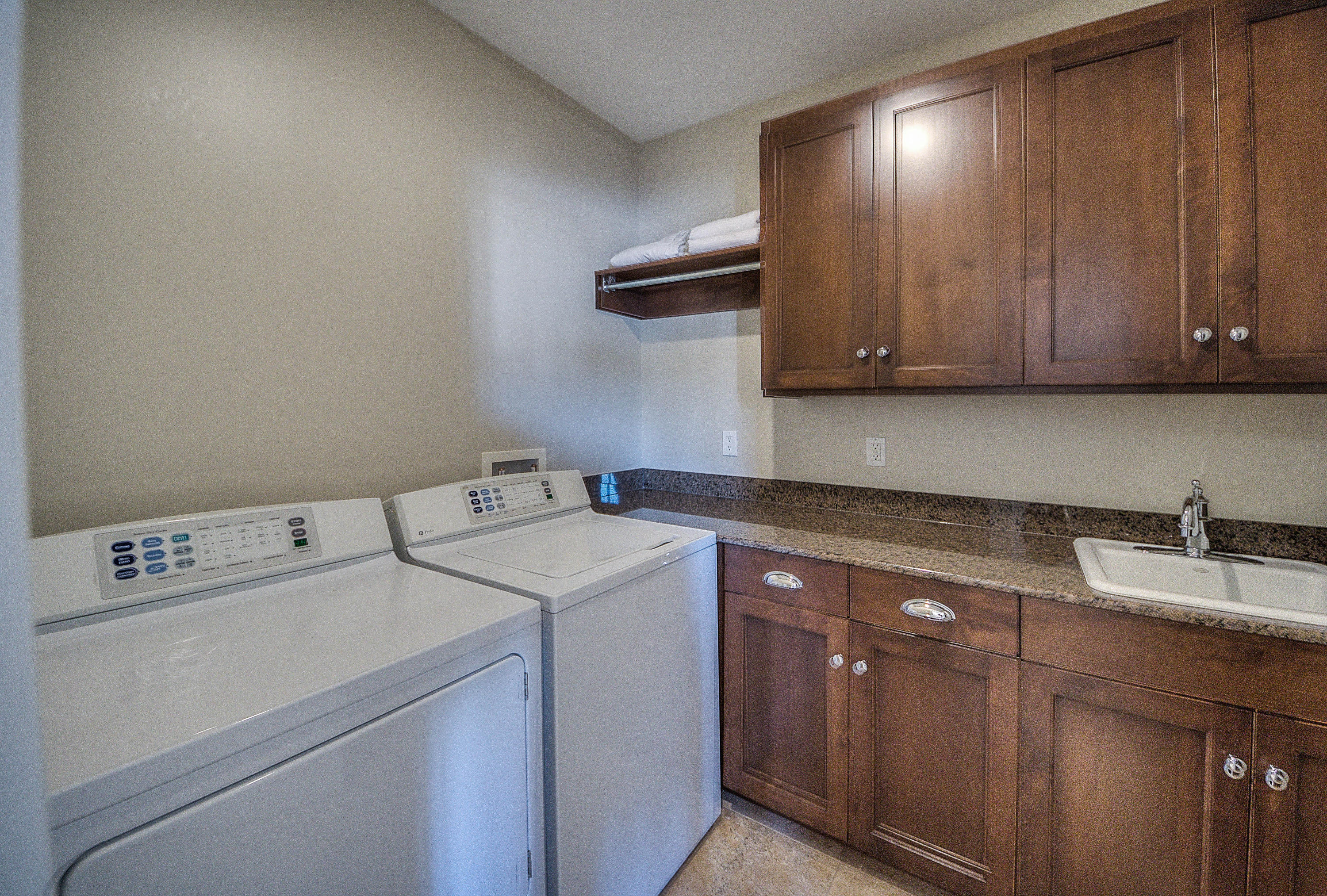 37 Compass Point Way, Unit 101 Watersound, FL 32461 - Photo 27 of 31 a utility room with dryer and washer