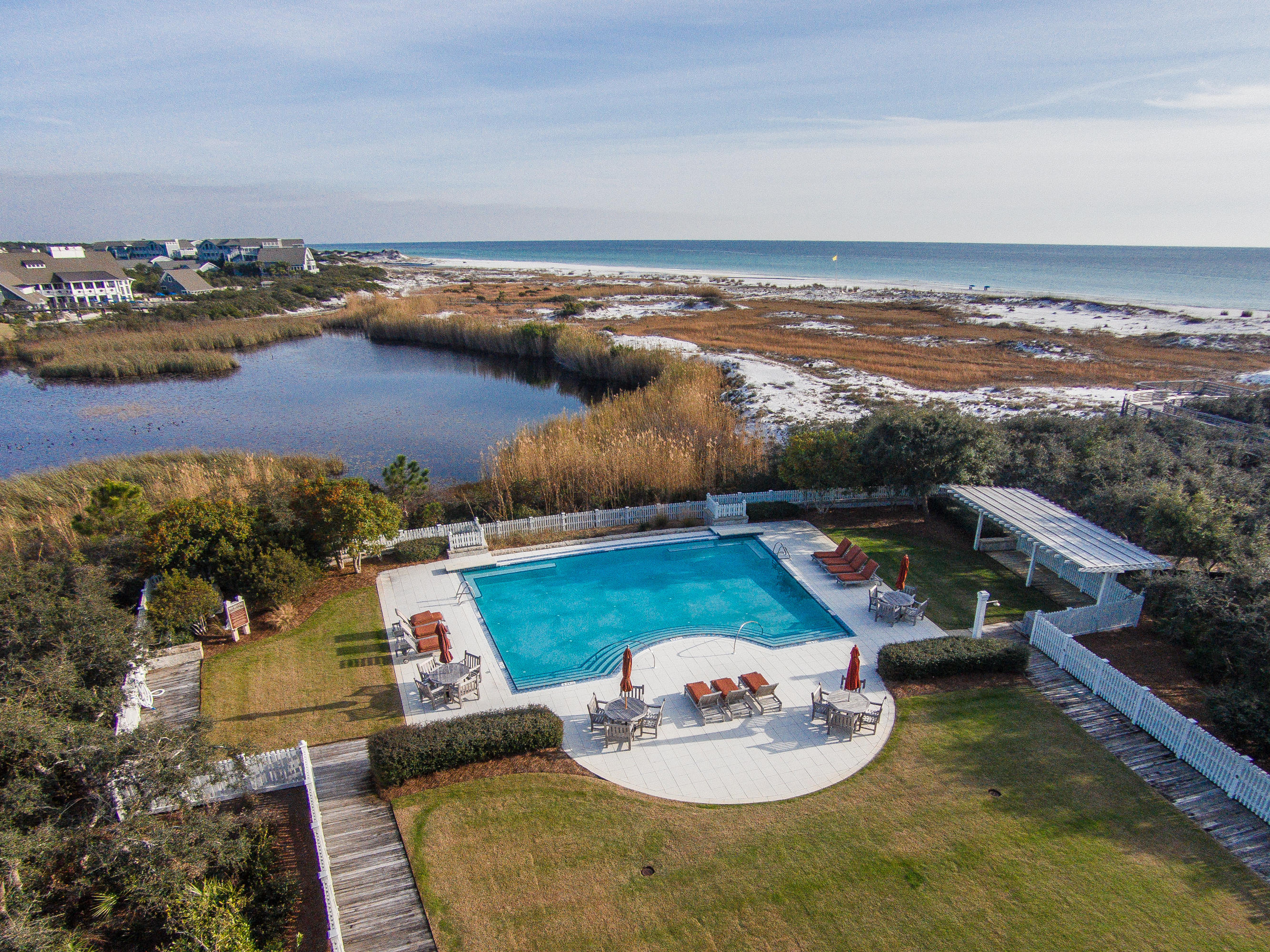 37 Compass Point Way, Unit 101 Watersound, FL 32461 - Photo 29 of 31 an aerial view of a house with yard swimming pool and ocean view
