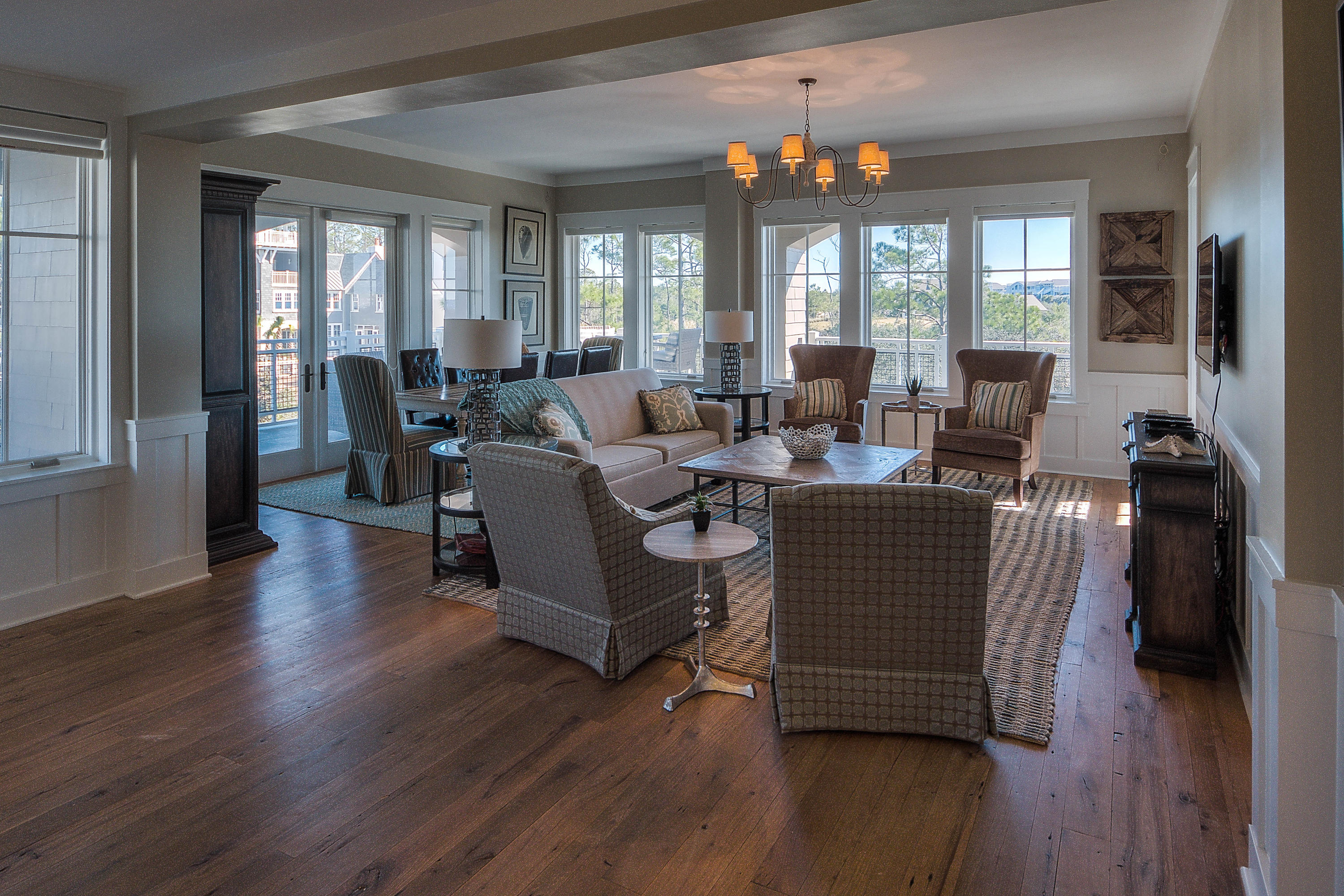 37 Compass Point Way, Unit 101 Watersound, FL 32461 - Photo 3 of 31 a living room with furniture and wooden floor